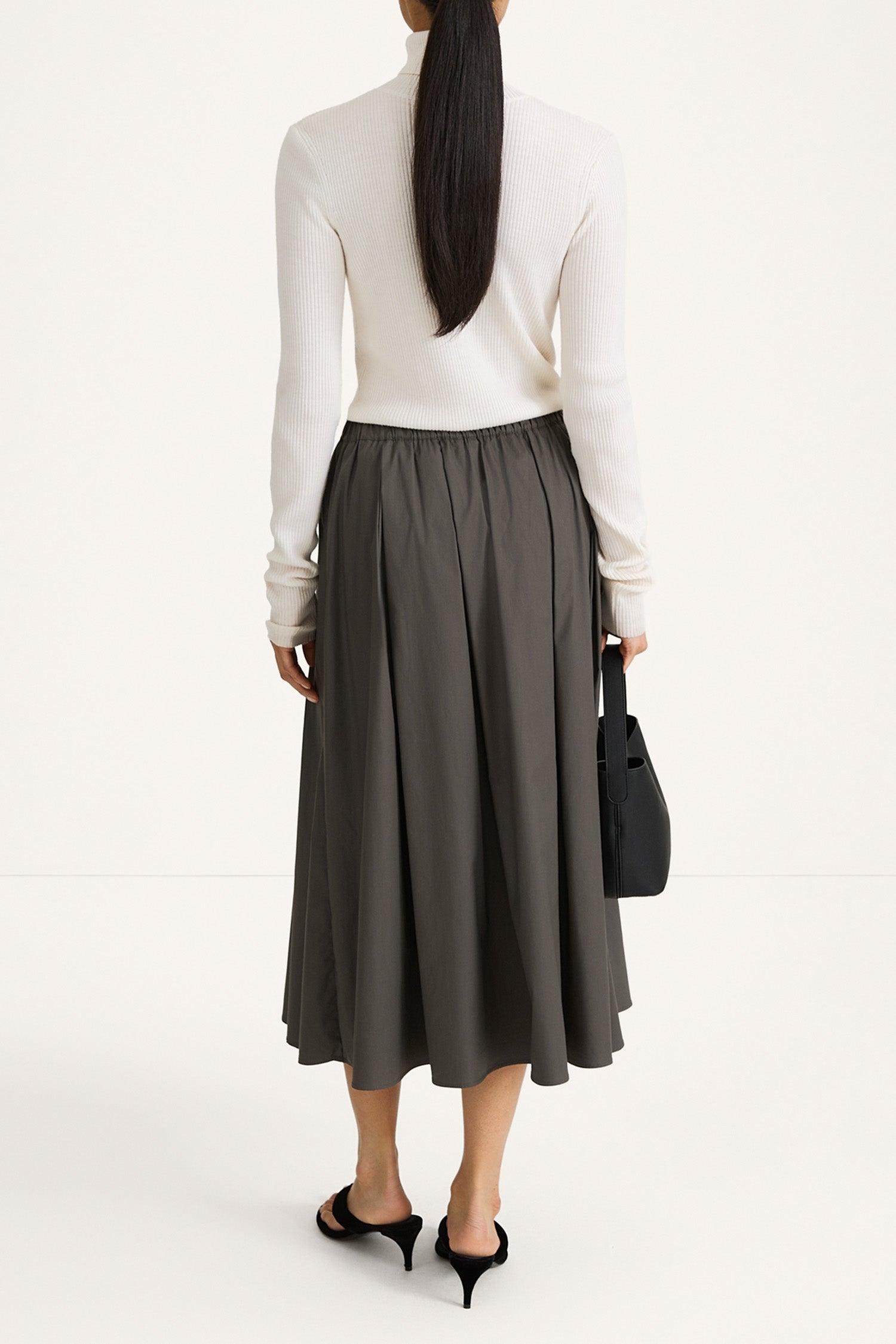 a-lined midi skirt in green stylein model image back