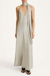 maxi slip dress in sage green with a scarf stylein macena model image