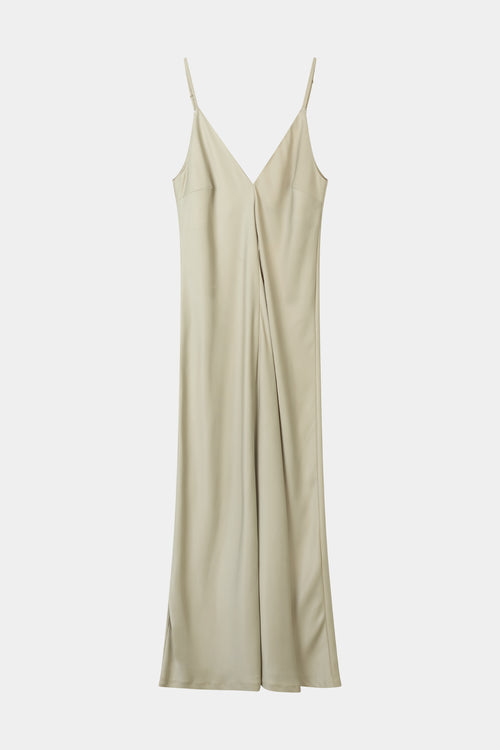 maxi slip dress in sage green with a scarf stylein macena model image