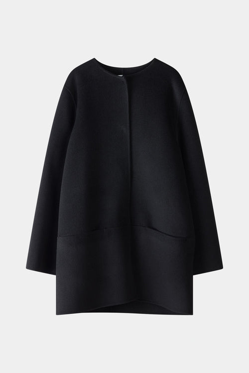Black wool coat stylein tara front model image