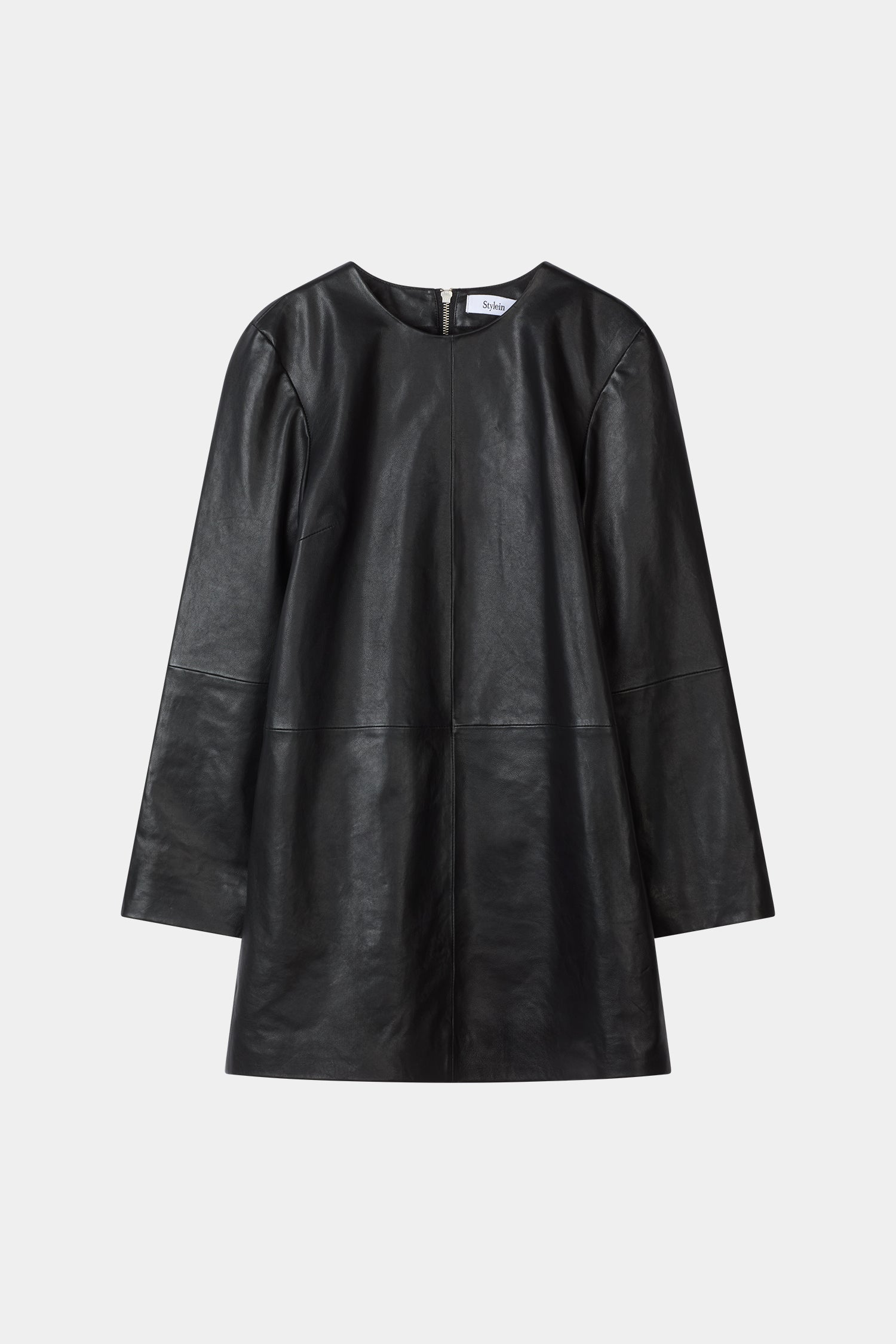A black leather long-sleeve dress with a relaxed, oversized fit and a round neckline, shown against a plain light gray background.