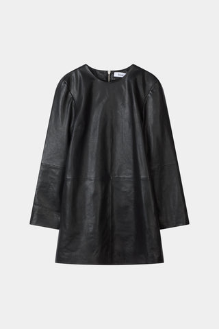 A black leather long-sleeve dress with a relaxed, oversized fit and a round neckline, shown against a plain light gray background.