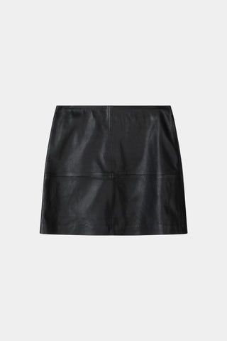 A black leather mini skirt with a structured, slightly cropped silhouette and a front seam detail, shown flat on a light gray background.
