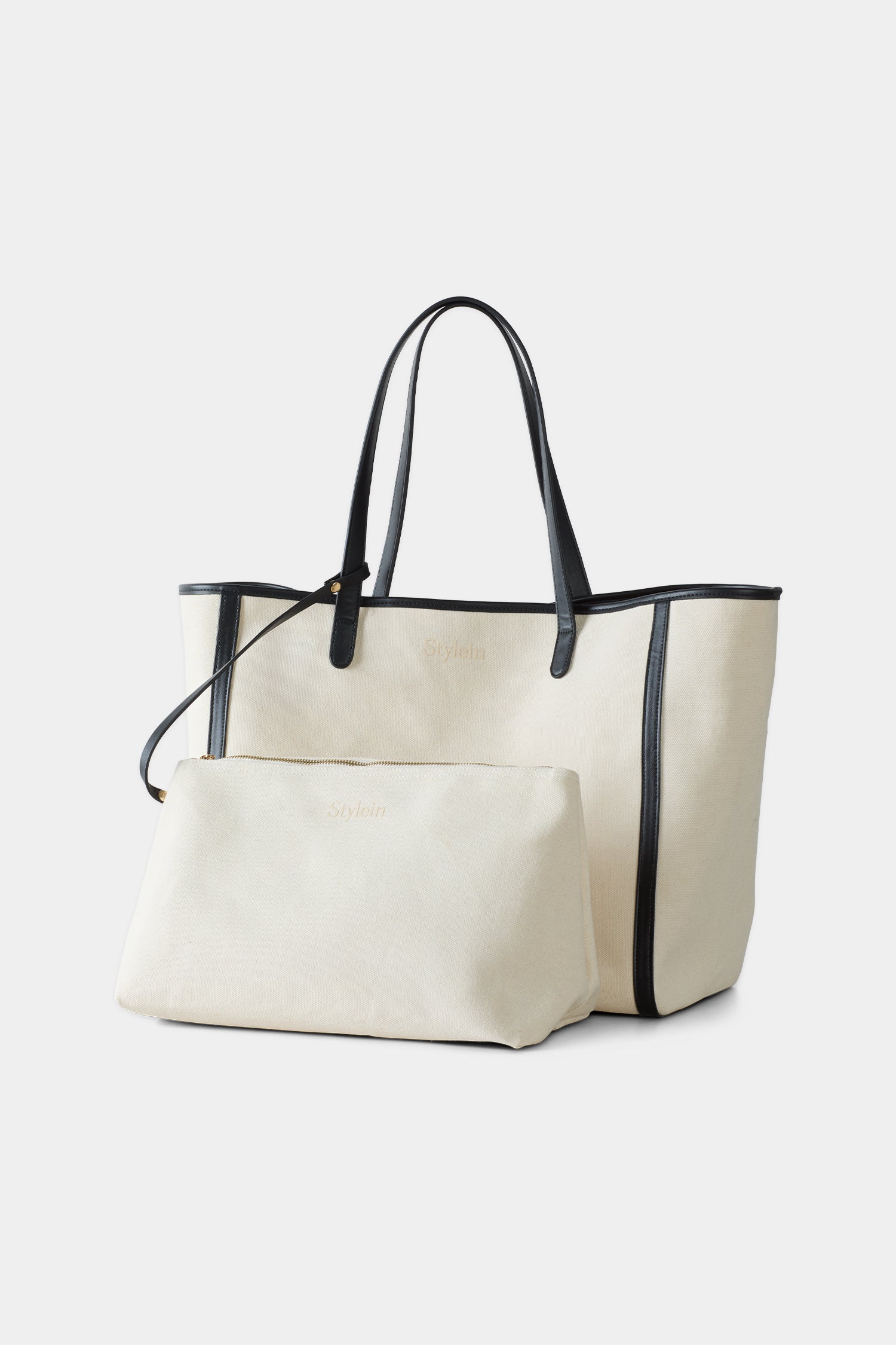 Yacht canvas bag cream black stylein packshot clutch front