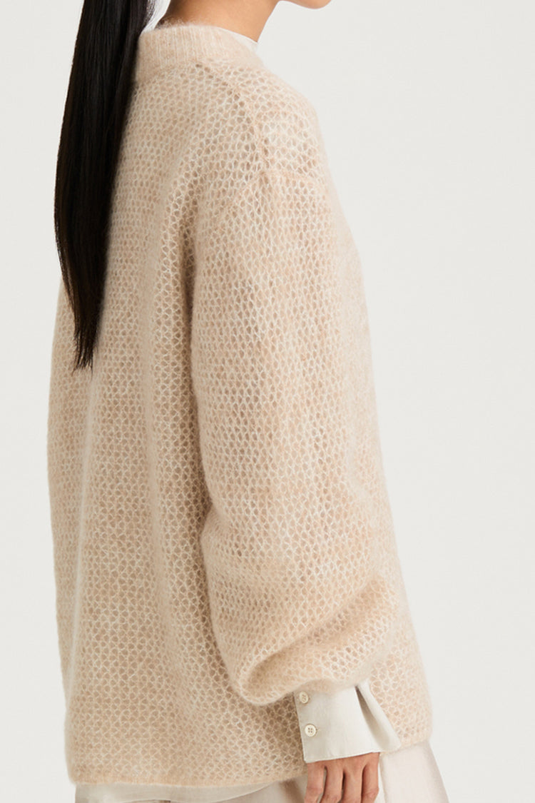 Beige knitted sweater stylein nella side close up model image