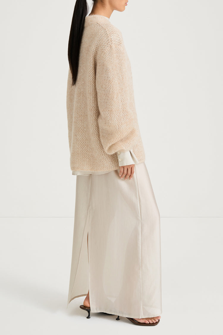 Beige knitted sweater stylein nella side model image