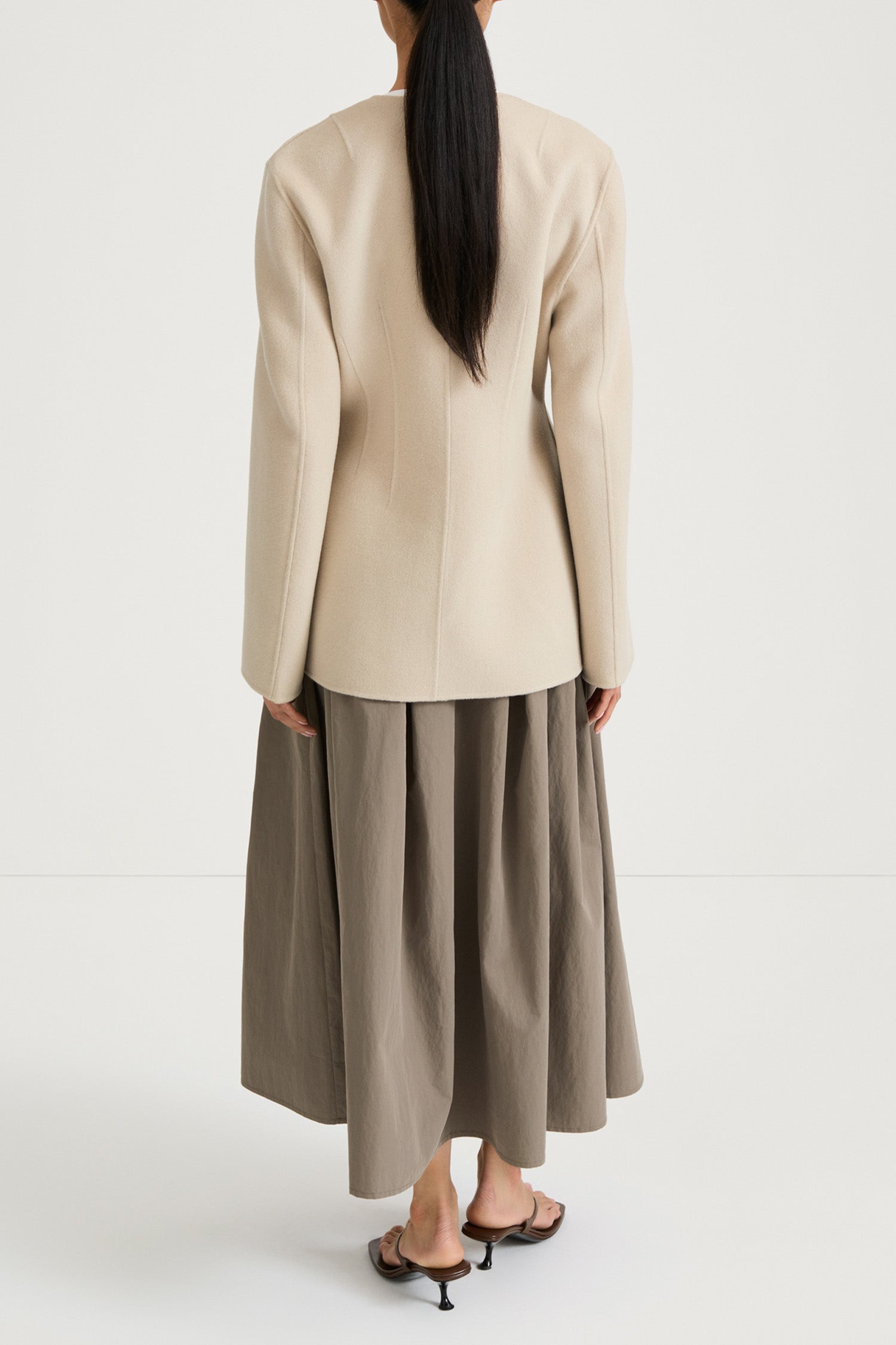 Beige wool jacket cinched waist stylein tyra back model image