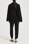 Black knitted sweater stylein nella back model image