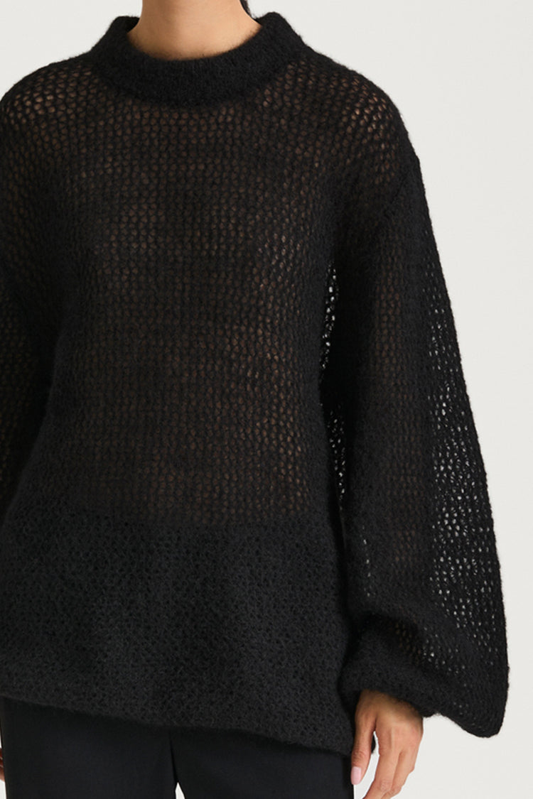 Black knitted sweater stylein nella close up front model image