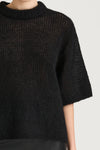 Black knitted transparent sweater short sleeve stylein nia front close up model image