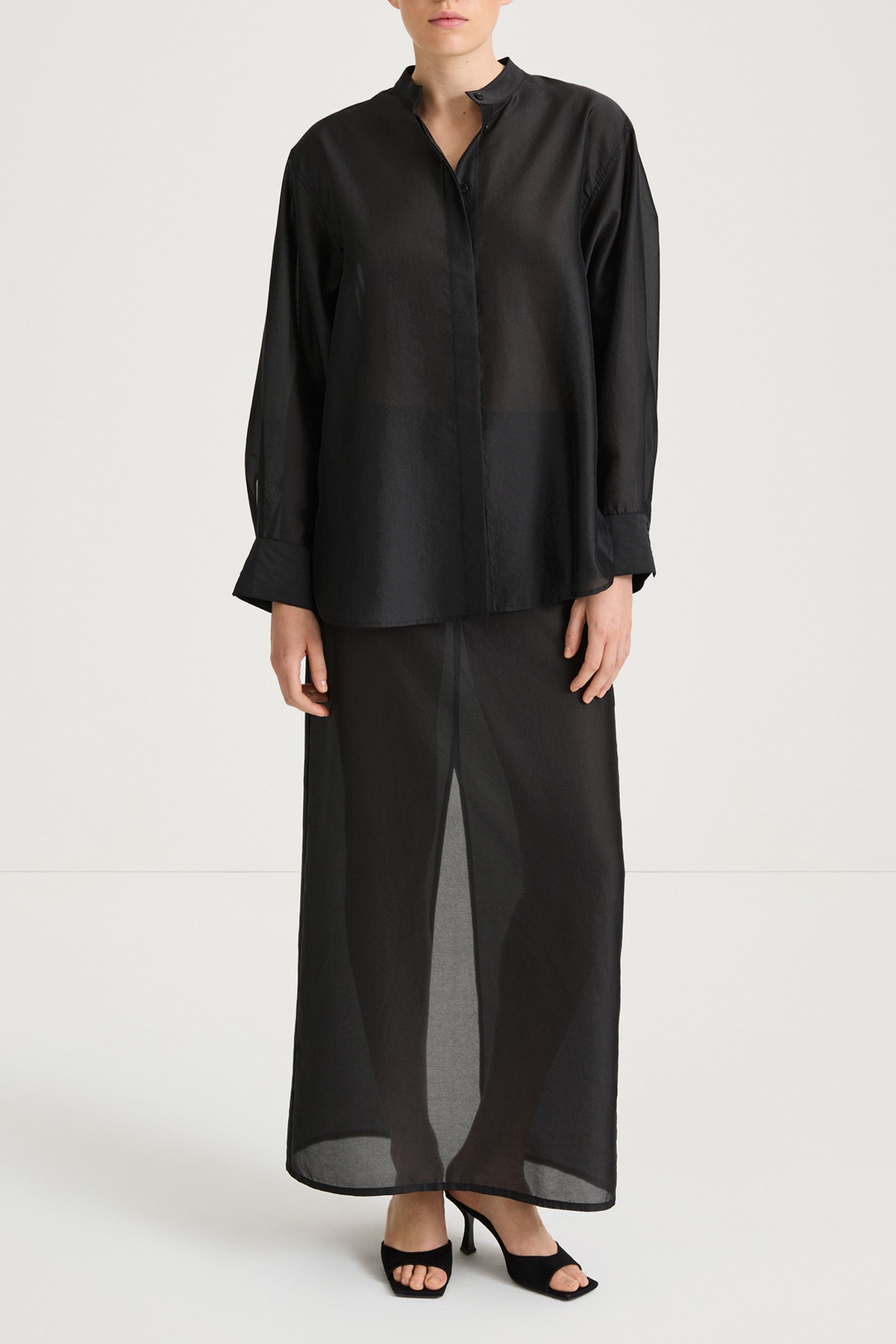 Black maxi transparent skirt stylein front model image