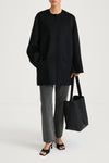 Black wool coat stylein tara front model image
