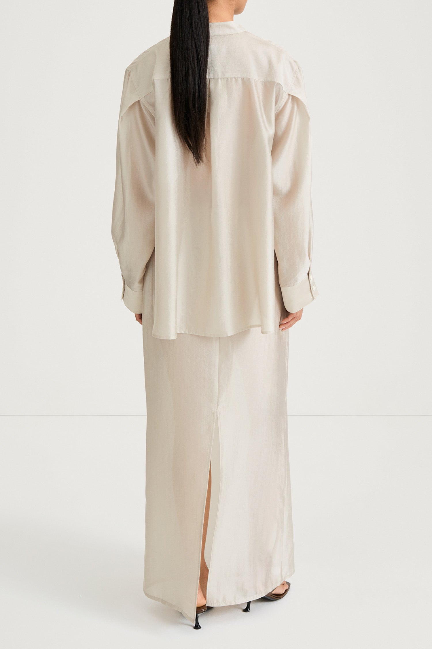Cream maxi transparent skirt stylein back model image