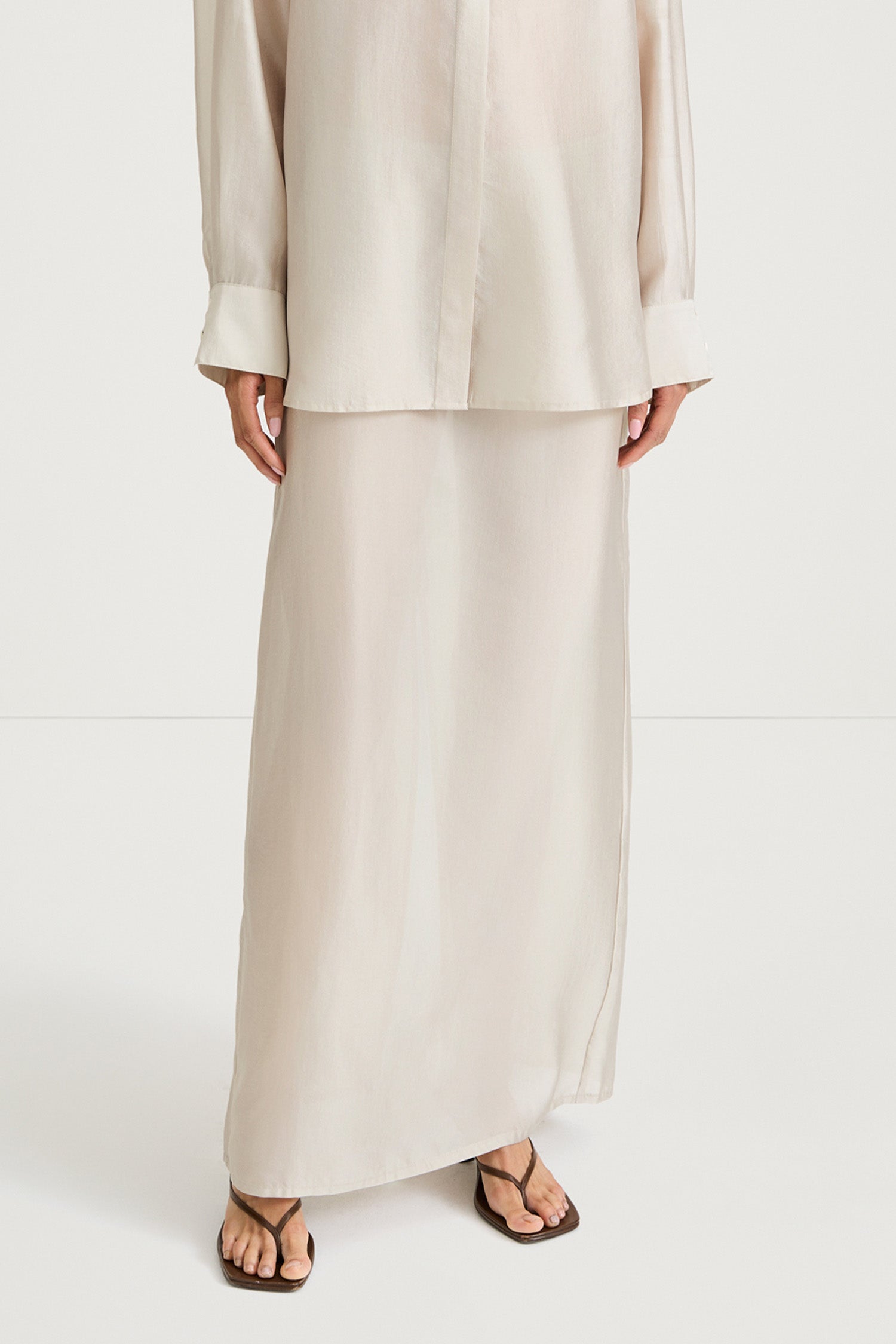 Cream maxi transparent skirt stylein front close up model image