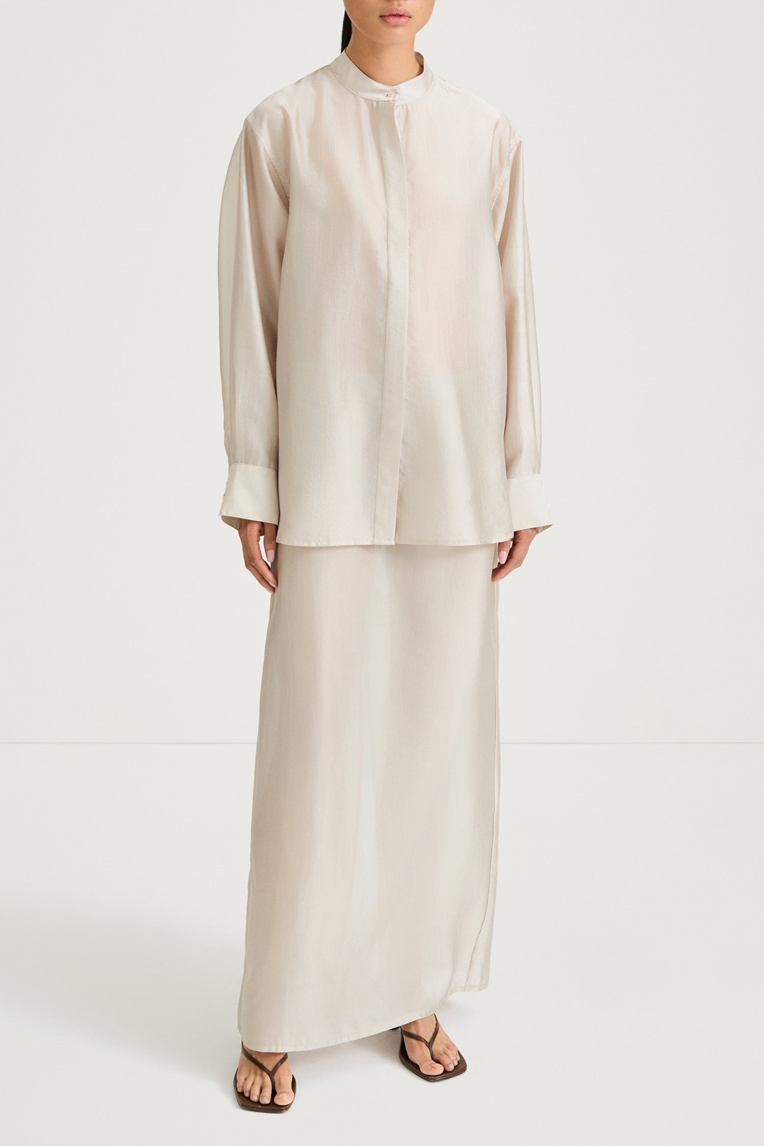 Cream maxi transparent skirt stylein front model image
