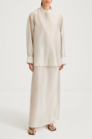 Cream maxi transparent skirt stylein front model image