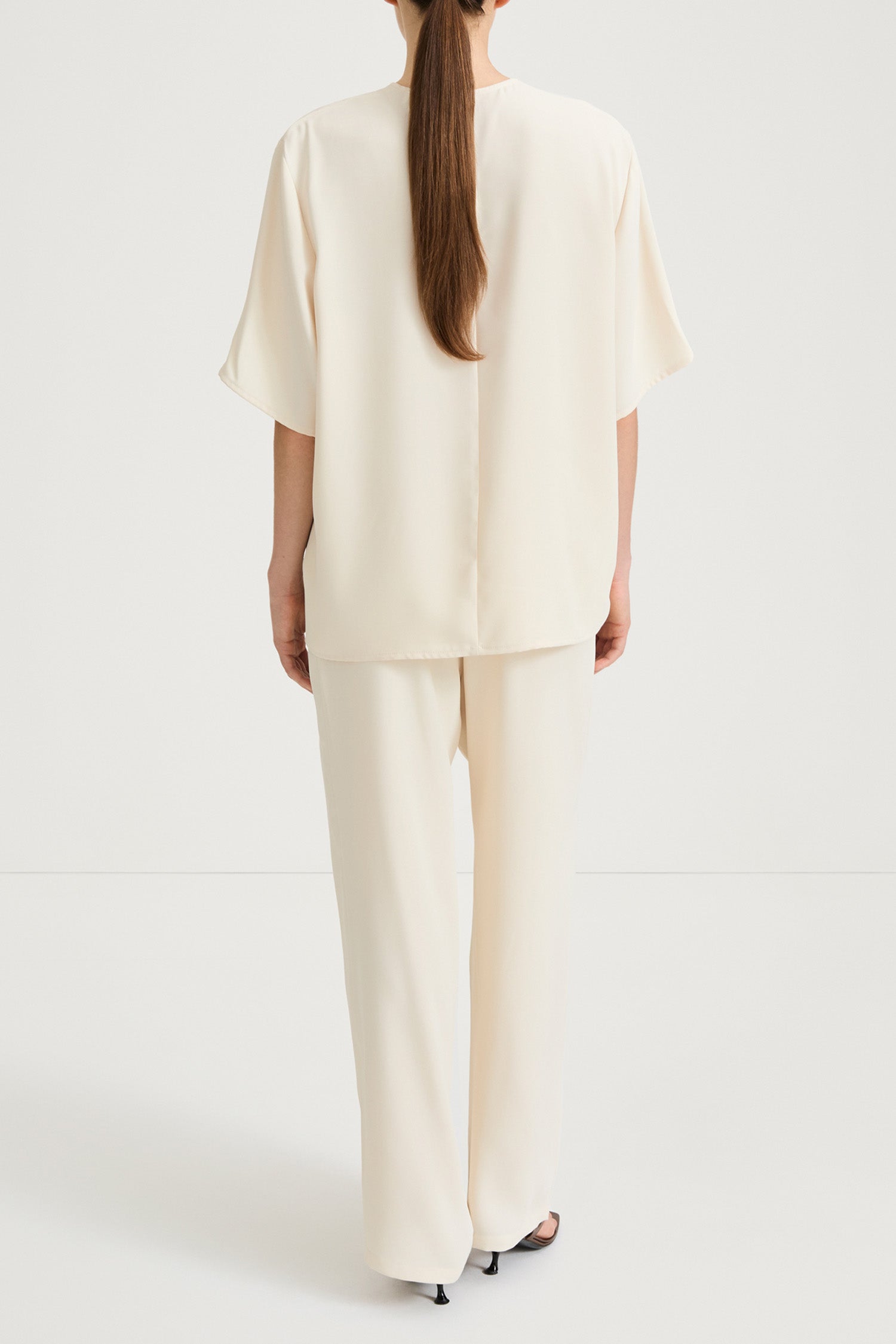 Cream trousers stylein meike back model image