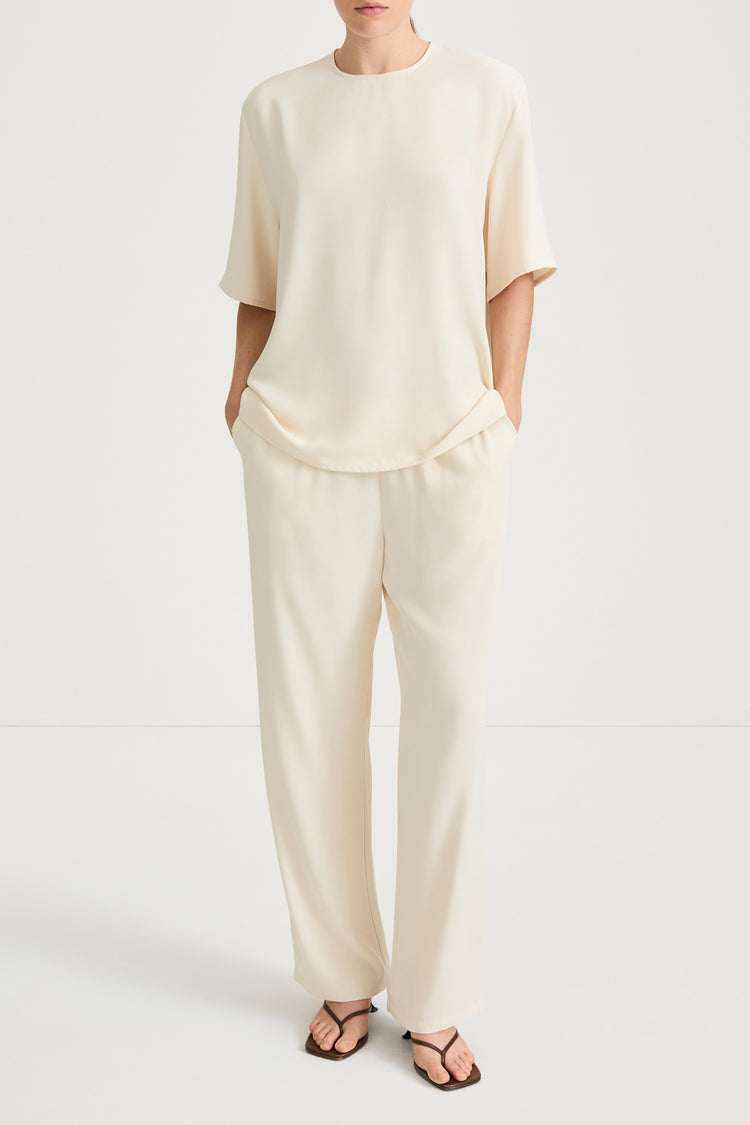 Cream trousers stylein meike front model image