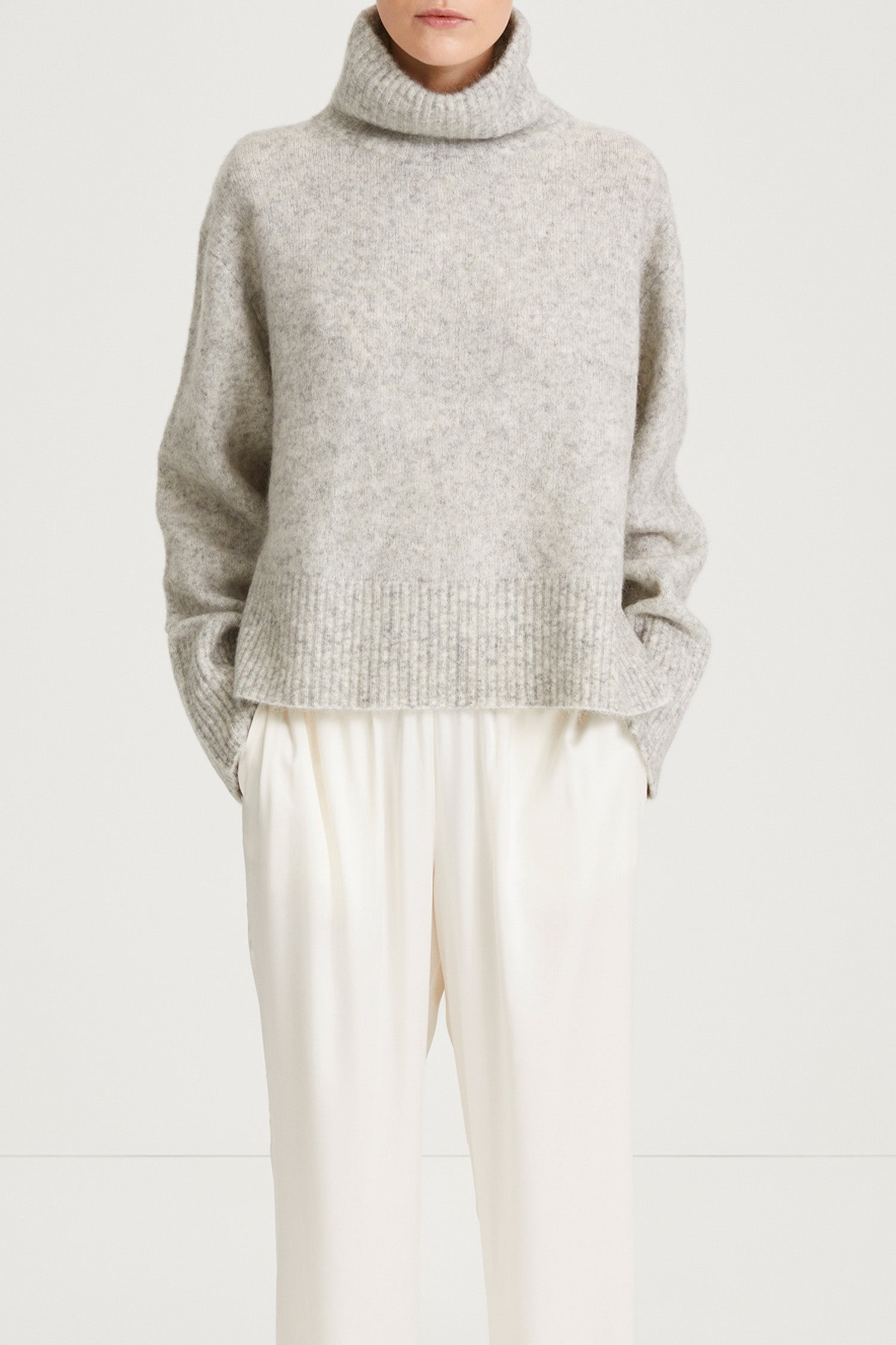 grey knitted polo sweater stylein nike close up