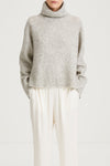 grey knitted polo sweater stylein nike close up