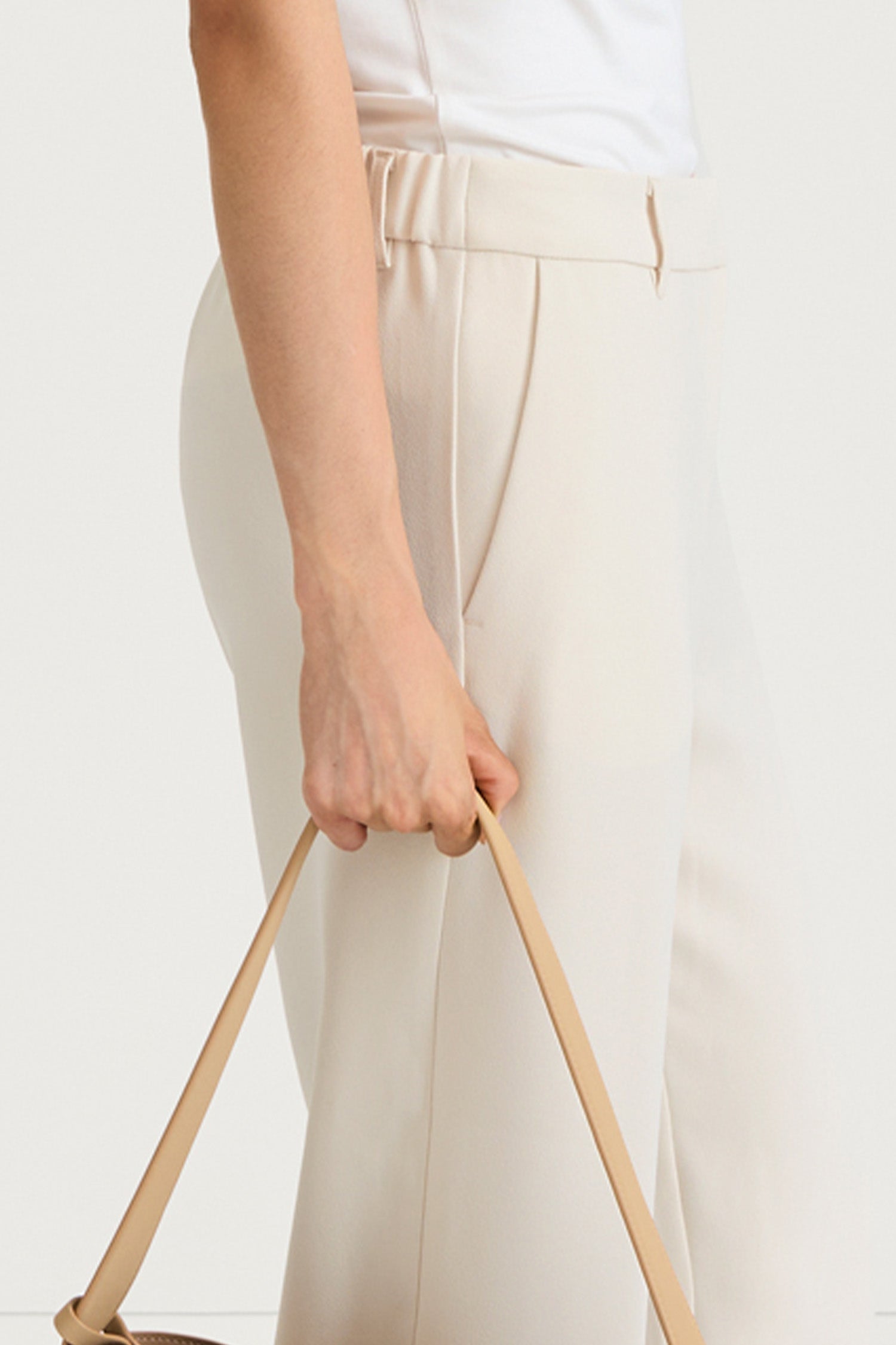 Ivory suit trousers bergio stylein side close up model image