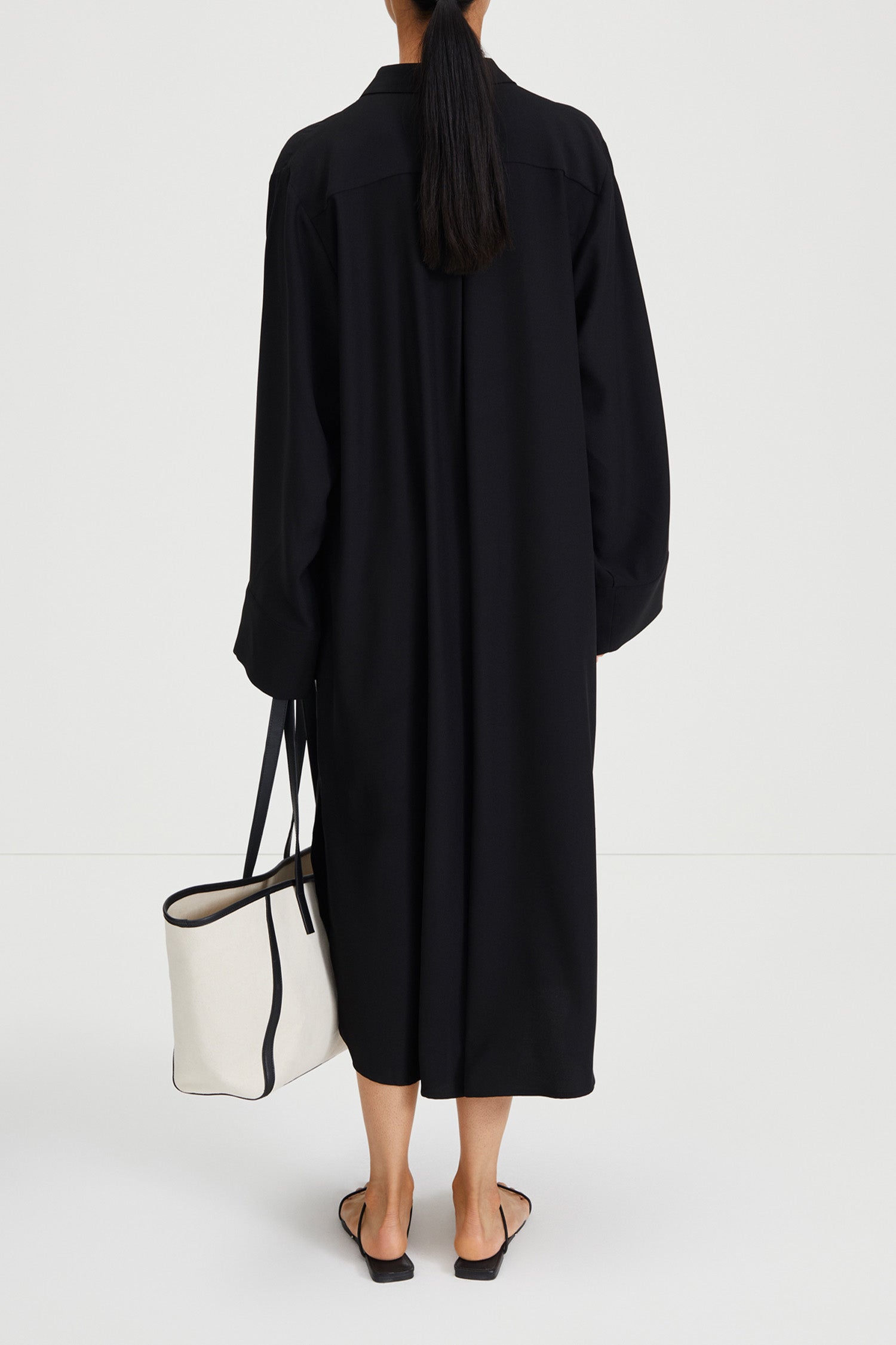 Montorio dress loose flowing long sleeves wide cuffs slits collar black stylein back image