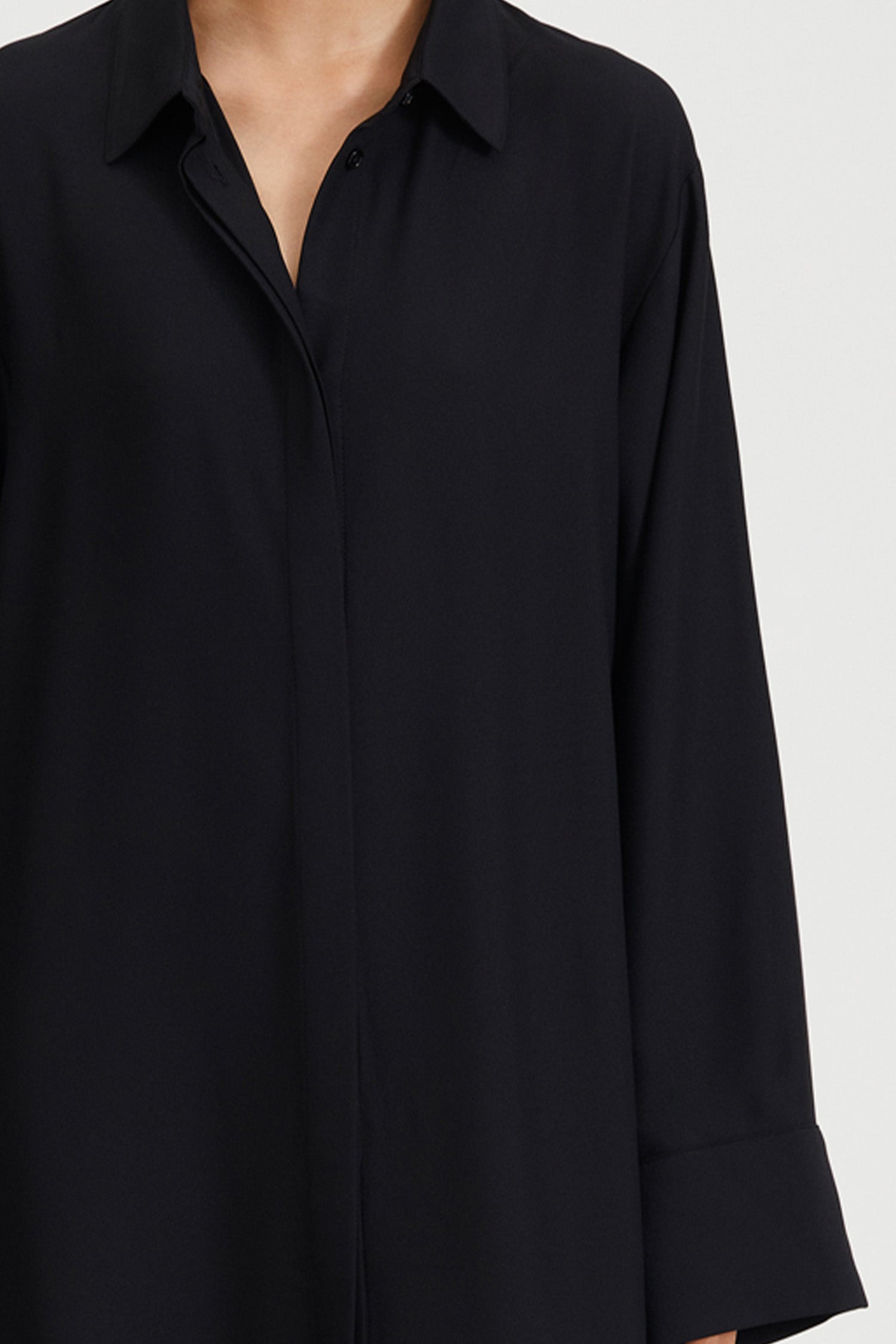 Montorio dress loose flowing long sleeves wide cuffs slits collar black stylein detail image