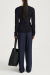 Navy buttoned cardigan stylein hamani back model image