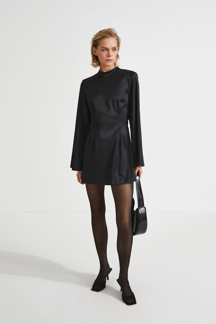 Bernalda dress shiny fabric short semi fitted  collar stand neckline thin shoulder pads flared full length sleeves black stylein front image