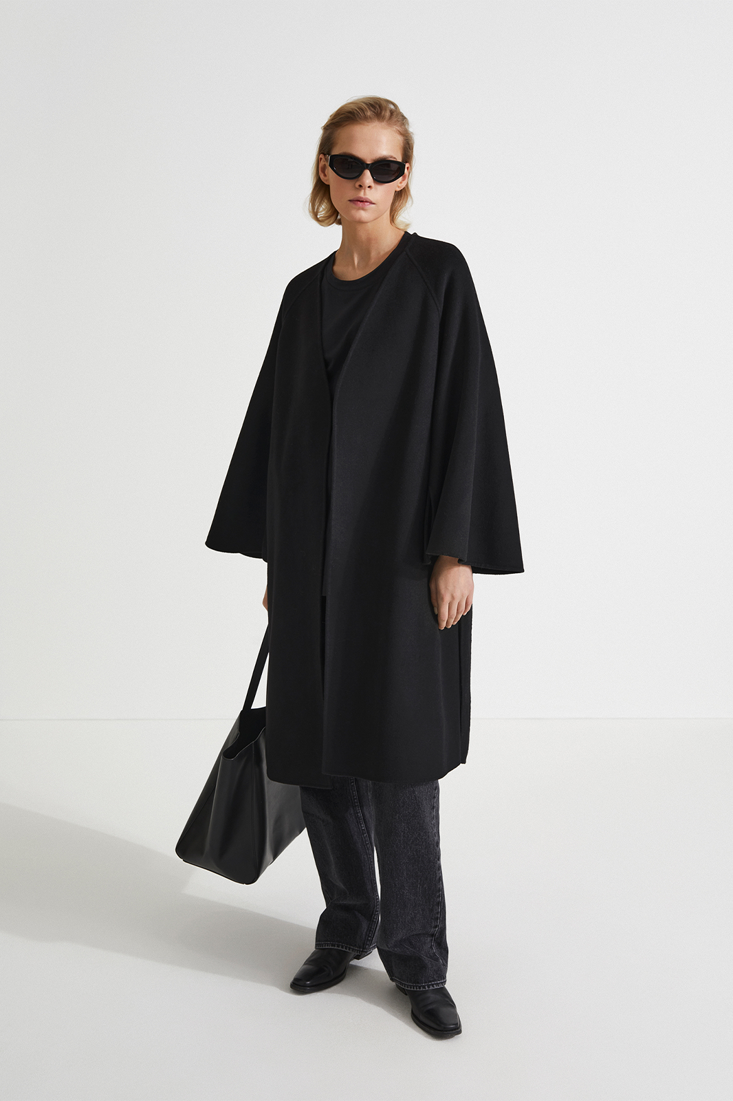 Trento coat long kimono inspired dropped shoulders flared full length sleeves attached belt wool mix black stylein front image