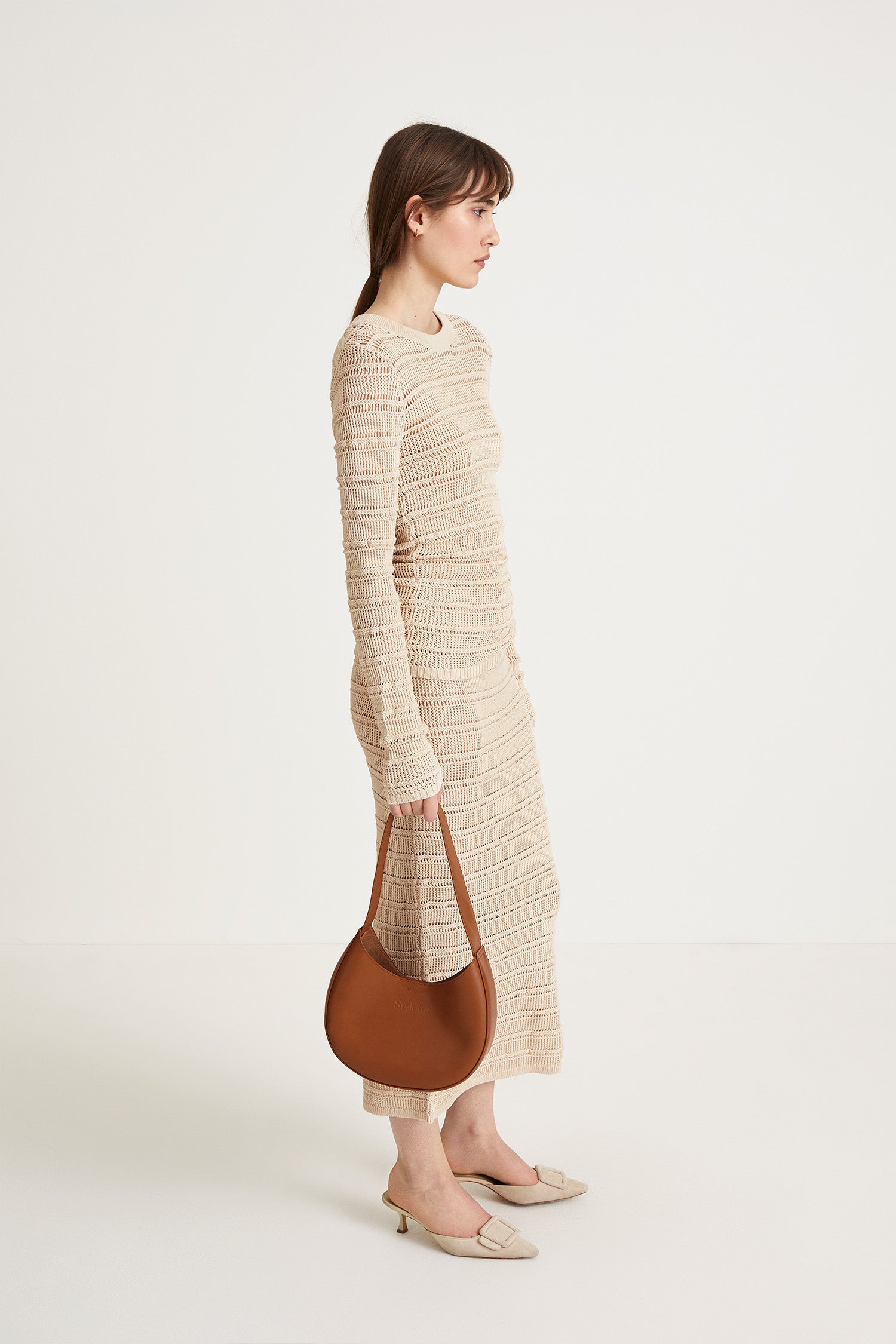 Peach top delicate knitted see-through top fitting silhouette full length sleeves cream stylein side image
