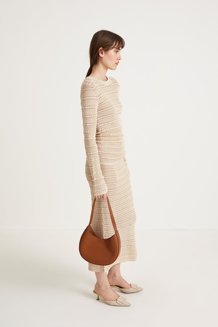 Peach top delicate knitted see-through top fitting silhouette full length sleeves cream stylein side image