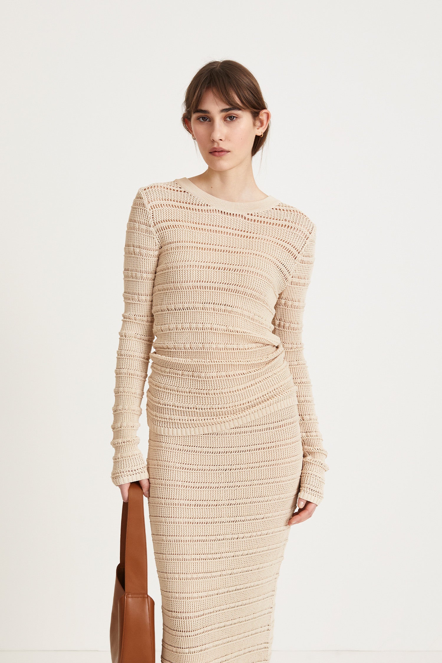 Peach top delicate knitted see-through top fitting silhouette full length sleeves cream stylein front image