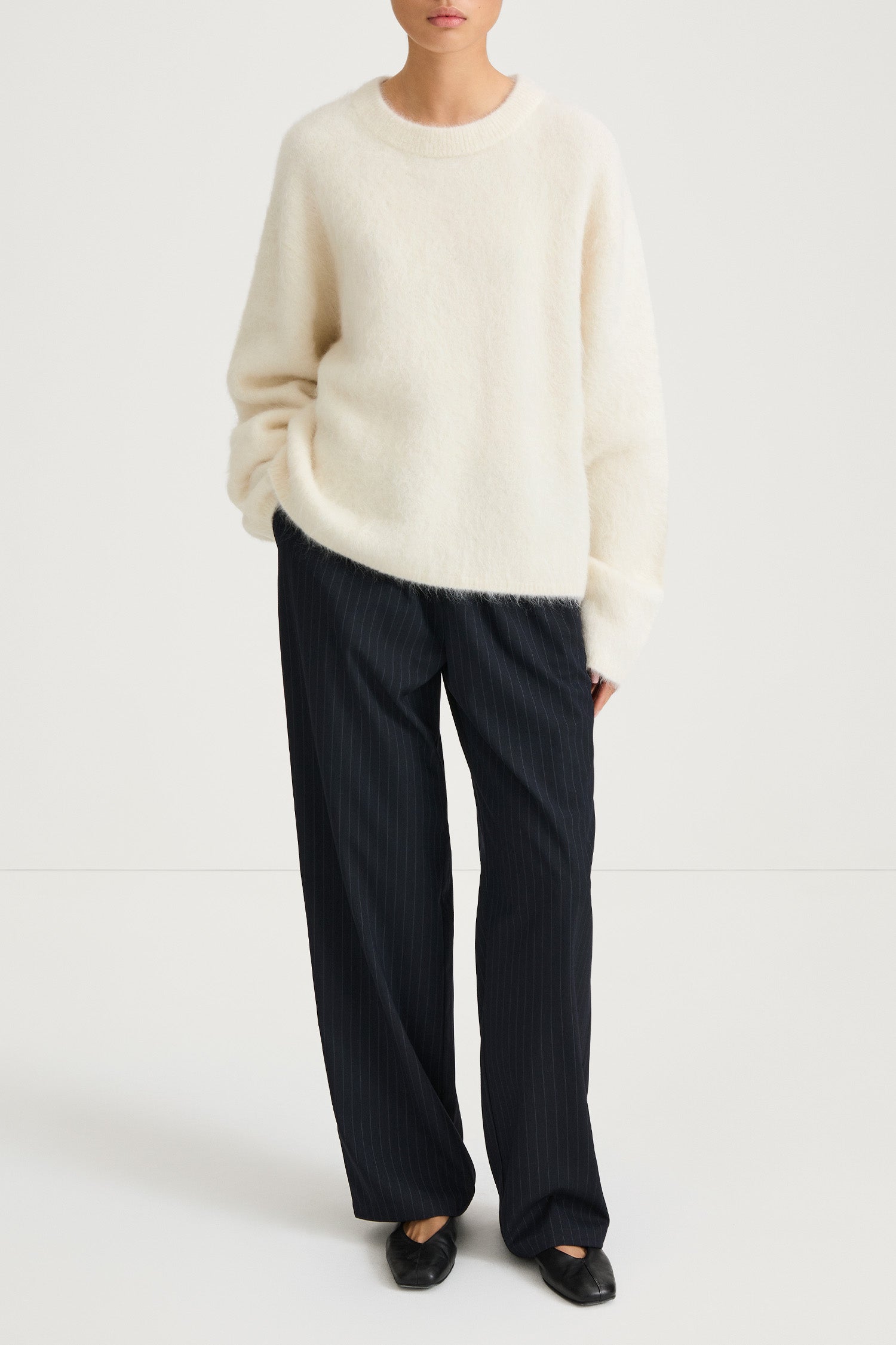 white alpacka knitted sweater stylein lorena model image