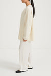 white alpacka v-neck sweater stylein liora side