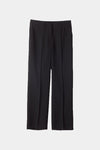 Boris is a pair of loose fitted trousers with sewn creases, pockets on the sides and loops for a belt in the waist.